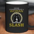 Never Underestimate A Woman Love Slash Coffee Mug