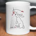 Rabbit And Winter Berries Coffee Mug