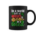 I N A W O R L D F U L L O F R O S E S A N D S U N F L O W E R B E A W E E D Coffee Mug