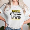 Caution I Watch Enough Id Channel To Know What Not To Do Unisex T-Shirt Gifts for Her